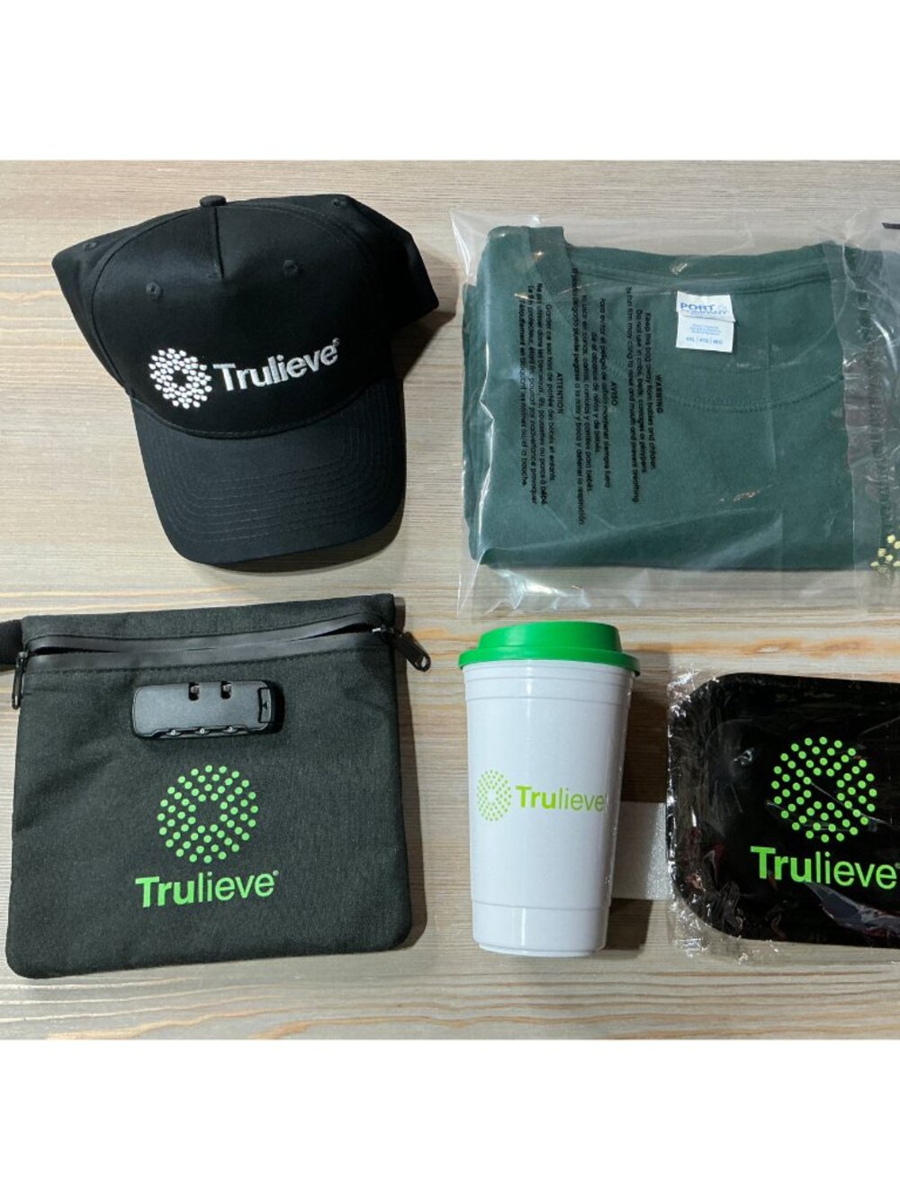Trulieve 5pc Swag Lot - Shirt, Locking Smell-Proof Bag, Hat, Tray & Travel Cup